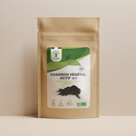 Sachet de superaliment charbon végétal actif Bioptimal présenté sur fond beige.