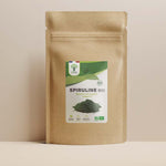 Sachet de superaliment spiruline poudre Bioptimal présenté sur fond beige.